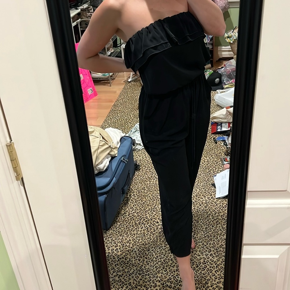 Glam medium black ruffle jumpsuit NWT